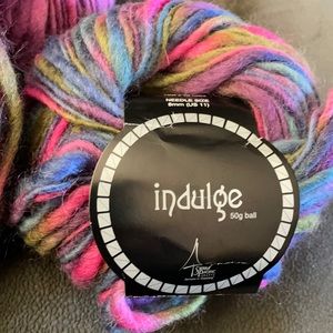 4 skeins of 100% spun variegated wool yarn. About 54 yards per skein. NIP